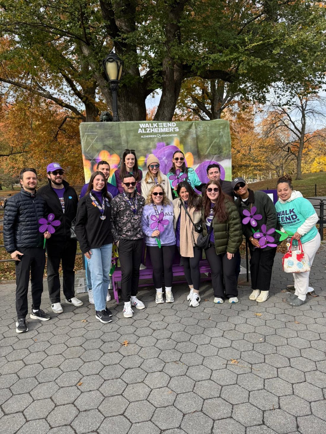 Ava Thomas and fellow volunteers in purple at the Manhattan Walk to End Alzheimer's