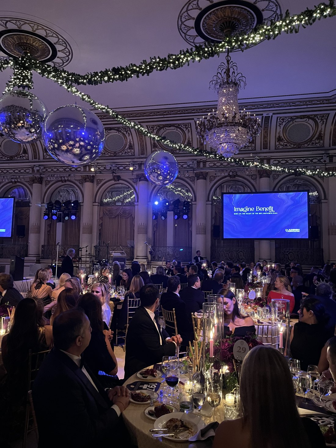 An Alzheimer's Association benefit gala dinner in an elegant ballroom